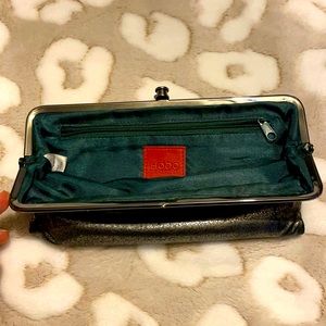 Hobo Wallet silver in color with green lining!